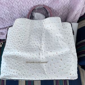 Peacock white never used, tags on purse dooney and Burke